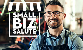 small business owner in apron smiling with the Small Biz Salute logo embedded